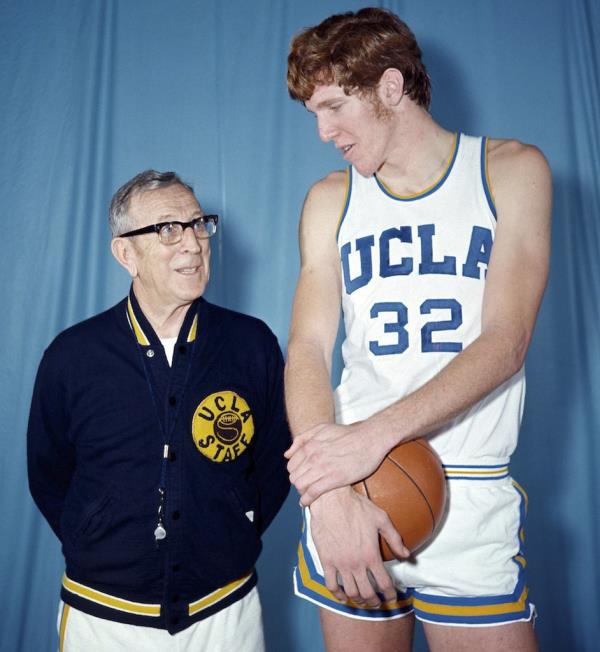 Bill Walton as a player at UCLA with legendary coach John Wooden.