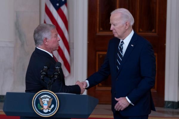 Jordan's King Abdullah II  and US President Joe Biden shake hands after they deliver remarks following a meeting at the White House in Washington, DC, on Feb. 12, 2024.</p>

<p>　　