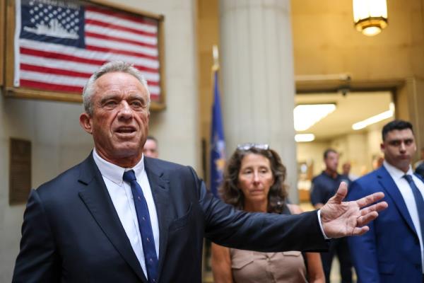 Robert F. Kennedy Jr. walks in the hallway of the Supreme Courthouse in Mineola, NY.