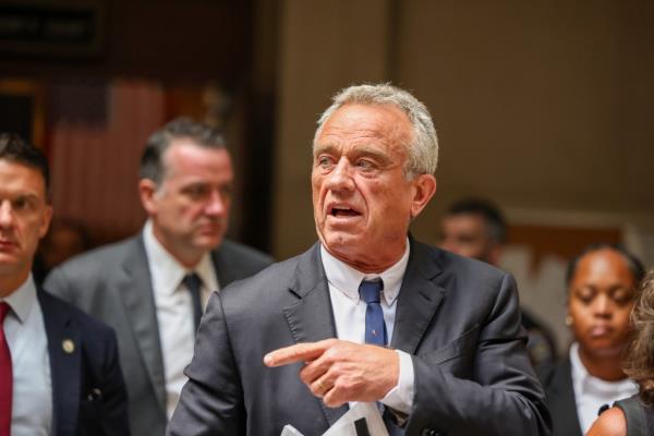 Robert F. Kennedy Jr. walks in the hallway of the Supreme Courthouse in Mineola, NY