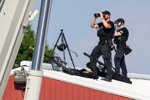 Secret Service snipers stand watch before former President Do<em></em>nald Trump campaign event in Butler.