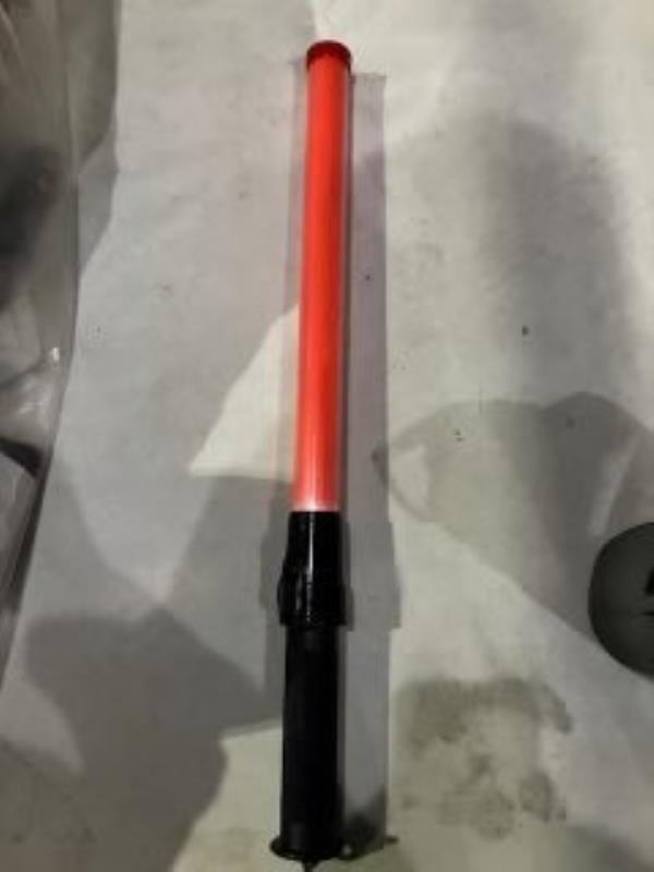 The cop was struck with an object that appeared to be a glowstick.