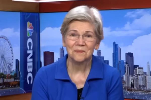 Senator Elizabeth Warren in a blue shirt discussing price gouging legislation with Vice President Kamala Harris.