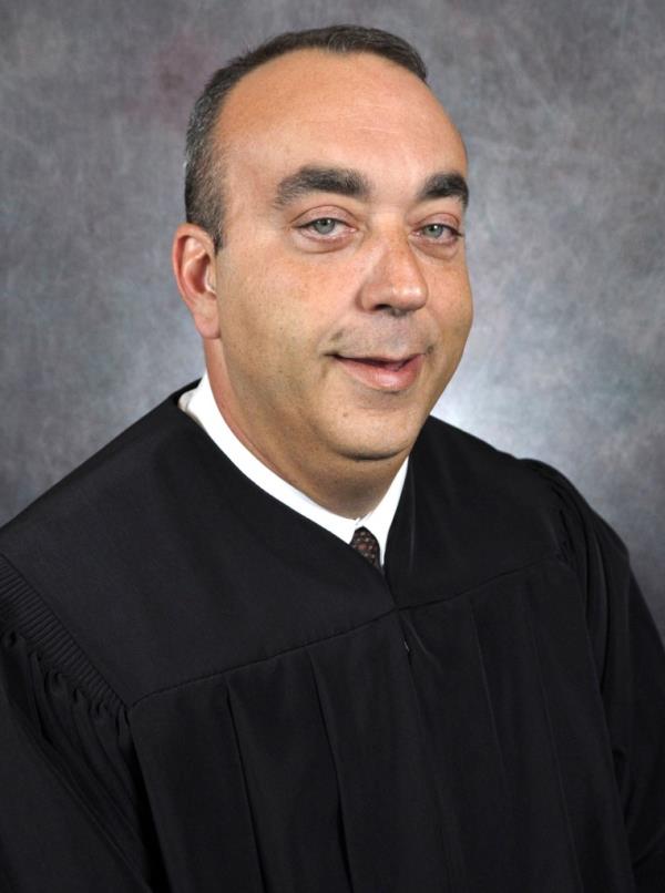 Mullins was killed in the chambers wher<em></em>e he served for 15 years.