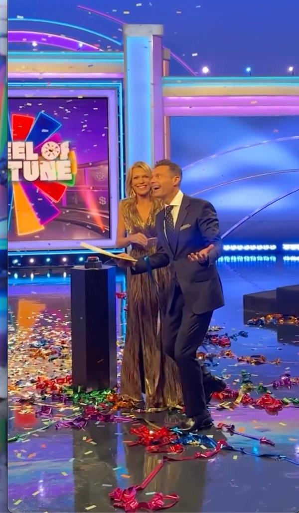 Ryan Seacrest and Vanna White on the set of 