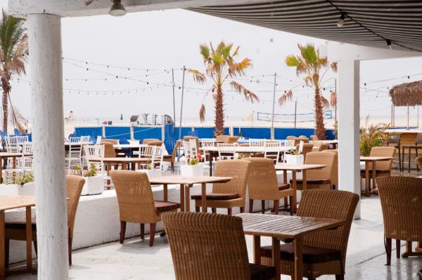 Outdoor dining area of the New York Beach Club.