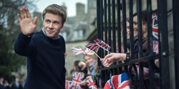  Ed McVey as Prince William waving to a crowd. 