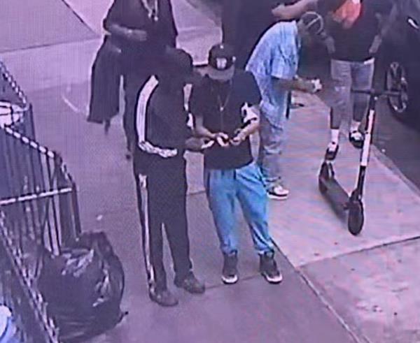 Still image of surveillance footage of drug deal.