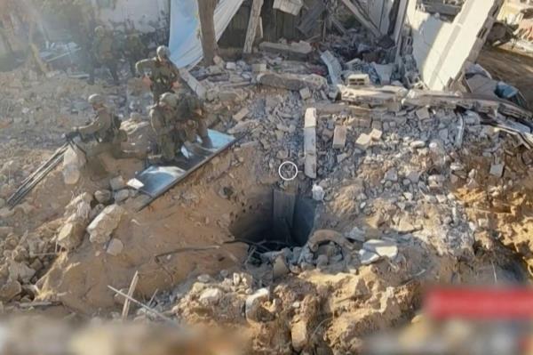 Footage released by the Israeli military showing an alleged entrance to a Hamas tunnel near al-Shifa hospital.