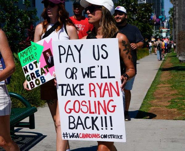 Members of actors unio<em></em>n, SAGA-AFTRA and the writers unio<em></em>n, the WGA, picket at Bro<em></em>nson Studios home of Netflix on July 12, 2023.