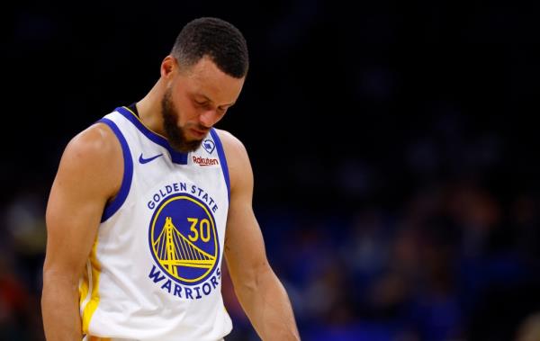 Stephen Curry #30 of the Golden State Warriors looks on during a game against the Orlando Magic at Kia Center on March 27, 2024 in Orlando, Florida.  