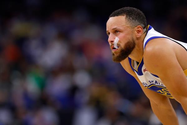 Stephen Curry #30 of the Golden State Warriors looks upset during a game against the Orlando Magic at Kia Center on March 27, 2024 in Orlando, Florida.  