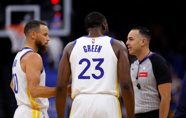 Draymond Green #23 of the Golden State Warriors argues with a referee before being ejected during a game against the Orlando Magic at Kia Center on March 27, 2024 in Orlando, Florida.
