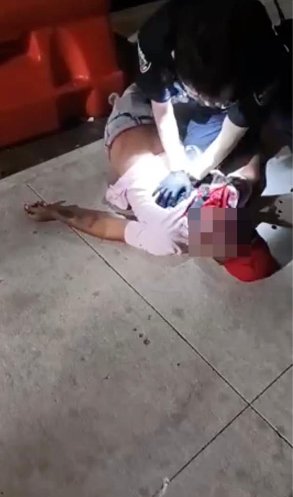 A man bleeding and shot on a Brooklyn sidewalk.