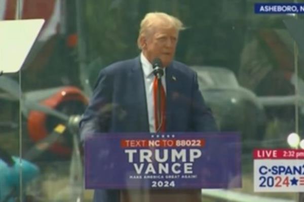 Do<em></em>nald Trump speaking in North Carolina, at his first outdoor rally since the assassination attempt.
