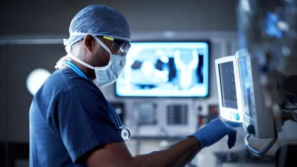 Vigilantly mo<em></em>nitoring his patient's vitals