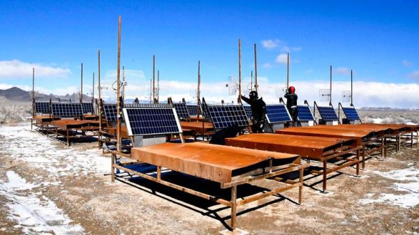 Researchers check the Telescope Array surface detector in the high desert in Delta, Utah, USA on February 19, 2019. The Telescope Array project is operated by Tokyo University, other universities and institutions from 6 countries, a<em></em>bout 130 researchers to observe air showers induced by cosmic rays with extremely high energy. The area is scheduled to be four times wider and 500 scintillator devices which are set will increase to 1000. ( The Yomiuri Shimbun via AP Images )