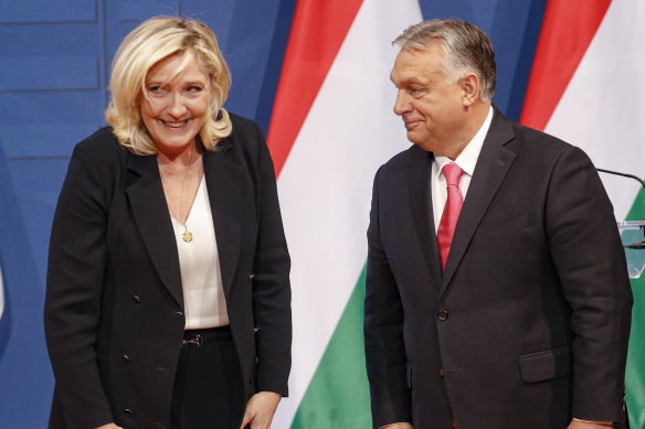 French far-right leader Marine Le Pen, left,with Hungarian Prime Minister Viktor Orban after a joint press co<em></em>nference in Budapest, Hungary, in 2021.