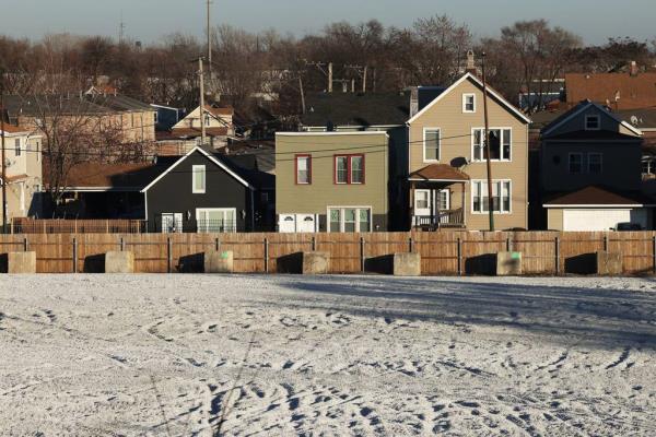 Homes across the street from the now-closed migrant tent encampment project are seen in the 3700 block of South California Avenue in Chicago's Brighton Park neighborhood on Dec. 14, 2023.