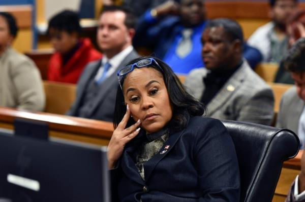 Fulton County District Attorney Fani Willis appears during a hearing regarding defendant Harrison Floyd, a leader in the organization Black Voices for Trump, as part of the Georgia election indictments, Nov. 21, 2023, in Atlanta.
