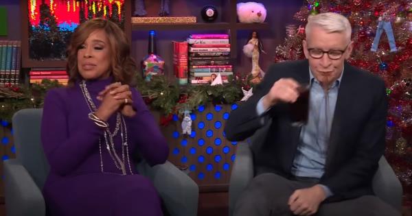 Watch Anderson Cooper spit out his drink over Gayle King sex question on TV