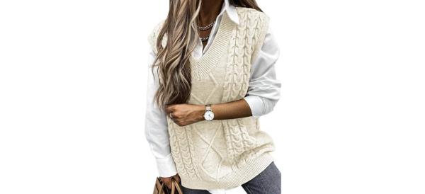 Woman wearing ivory-colored e<em></em>valESS Oversized Sweater Vest for Women
