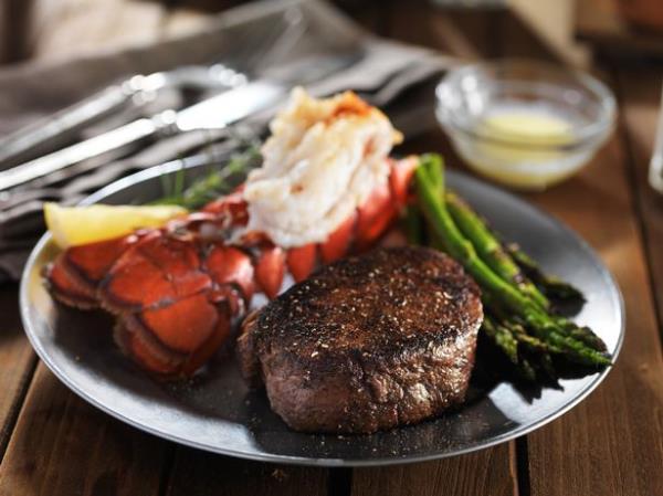Among the extravagant order he requested, steak and lobster were both on the menu