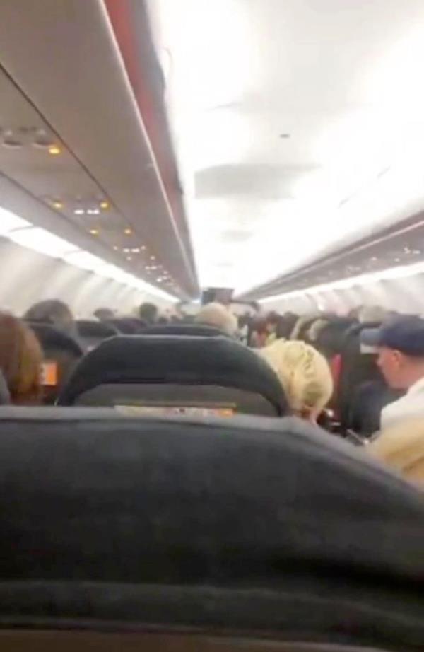 The pilot asked up to 20 people to volunteer to leave