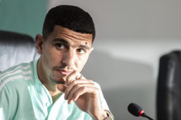 Algeria's defender Youcef Atal giving a press co<em></em>nference on January 15, 2022 in Douala, Cameroon.