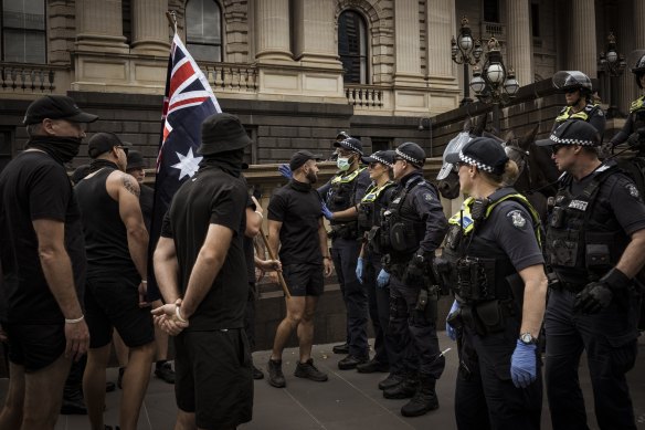 Neo-Nazis square off against police at the co<em></em>ntroversial Let Women Speak rally in Melbourne in March 2023.