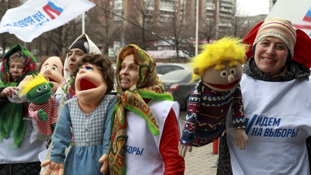 Volunteers perform for voters on the eve of the election in Donetsk, the capital of Russian-co<em></em>ntrolled Do<em></em>netsk region, eastern Ukraine.